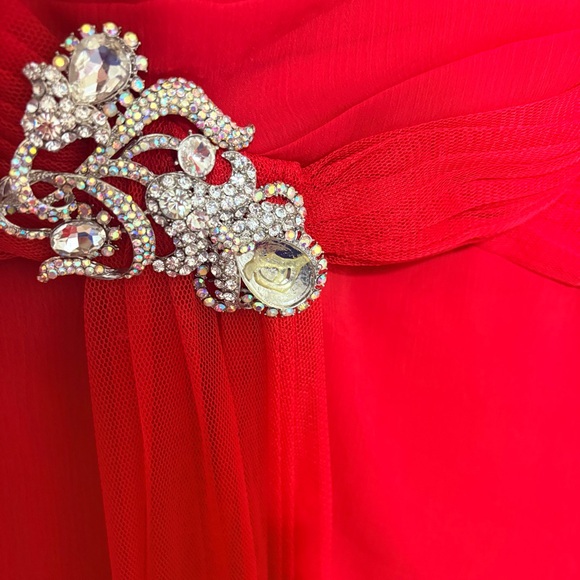 Red strapless gown is a Faviana style 7131 formal dress - Picture 4 of 9